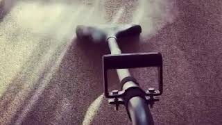 Steam cleaning of carpets for deep dirt removal.