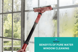 "Pure water window cleaning using a squeegee on a glass window, ensuring a streak-free finish