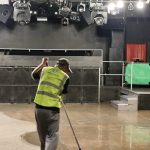 Commercial bar floor mopping after event cleaning by Triple Star.