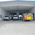 Triple Star Commercial Cleaning team performing professional cleaning services at a fire station, with company vehicles present in Auckland and Christchurch