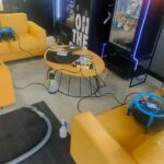 Yellow couches in commercial lounge drying after upholstery cleaning