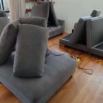 Soft playroom couches at a preschool set up for cleaning and drying
