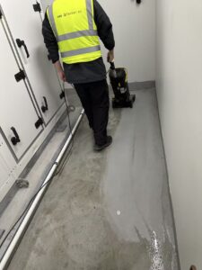 Commercial plant room floor scrubbing and builders cleaning in Christchurch using professional floor cleaning equipment by Triple Star Commercial Cleaning.