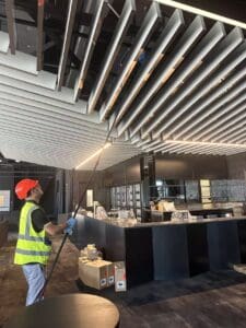 Detailed ceiling and hospitality bar area cleaning at One New Zealand Stadium, Christchurch, as part of the builders cleaning process.